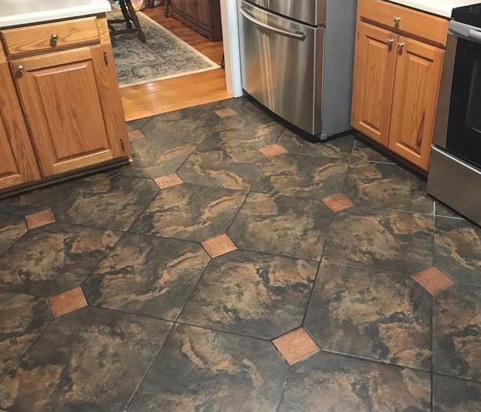 Kitchen flood with no apparent water damage, but underlying issues