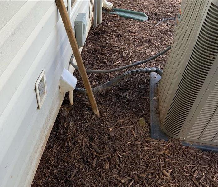Photo of A/C unit that caused mold loss