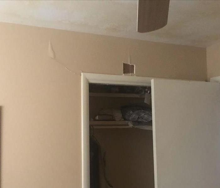 Water damage to wall and ceiling of home