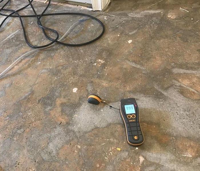 moisture level reading on floor being stabilized 