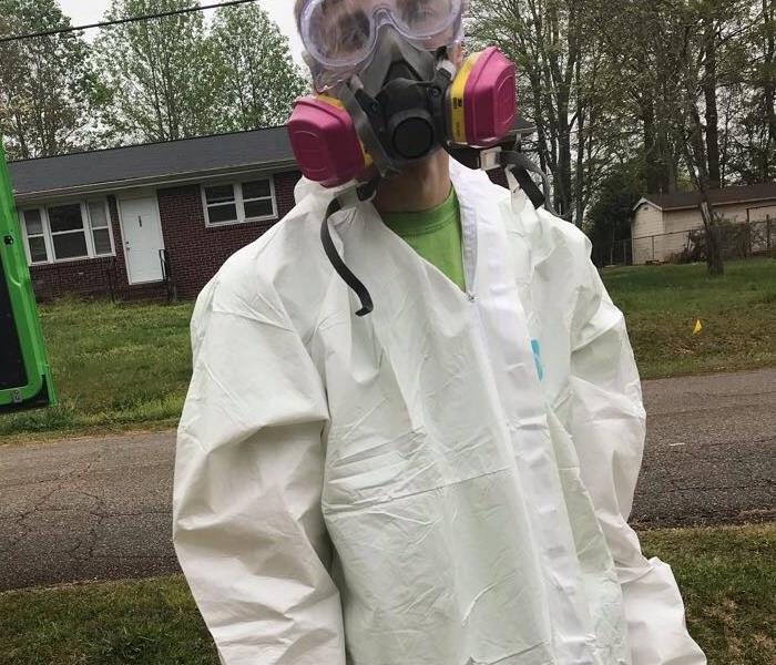 production member wearing personal protective equipment 